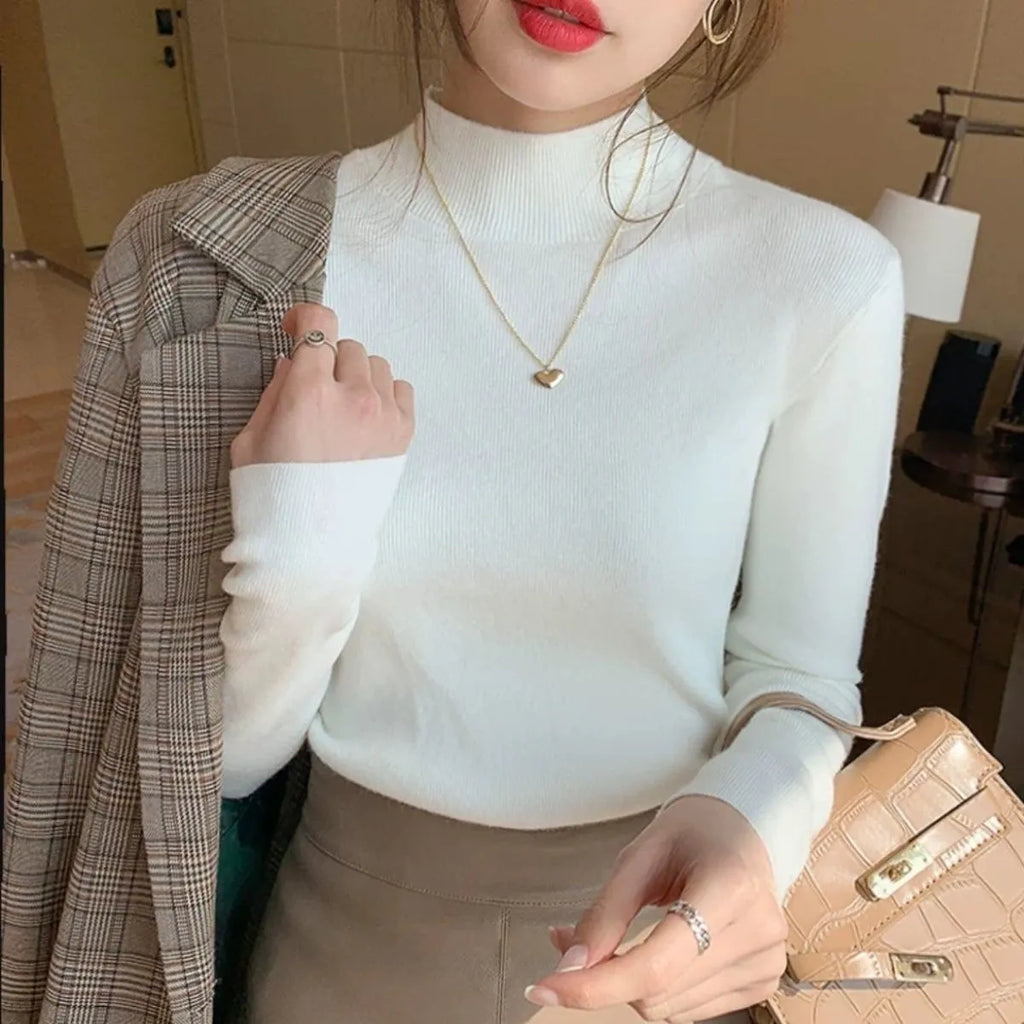 Slim fit knitted bottoming shirt in viscose fabric, shown in apricot colour.