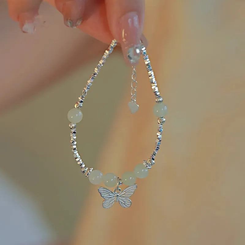 Hetian jade bracelet and necklace set for women with silver butterfly charms on electroplated copper chains