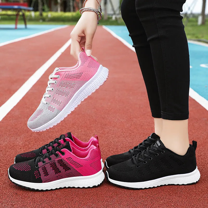 Women's Flyknit running shoe in black, rose red, or gray pink with soft sole and flat heel.