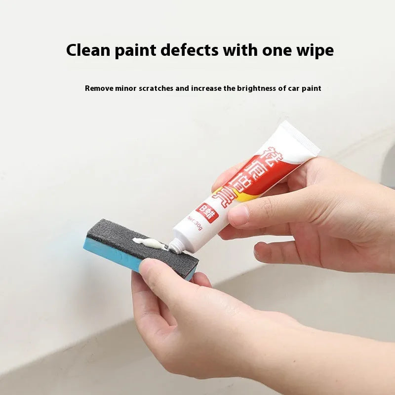 Car repair wax kit with bottles of A and B wax and a frosted sponge applicator for paint correction.
