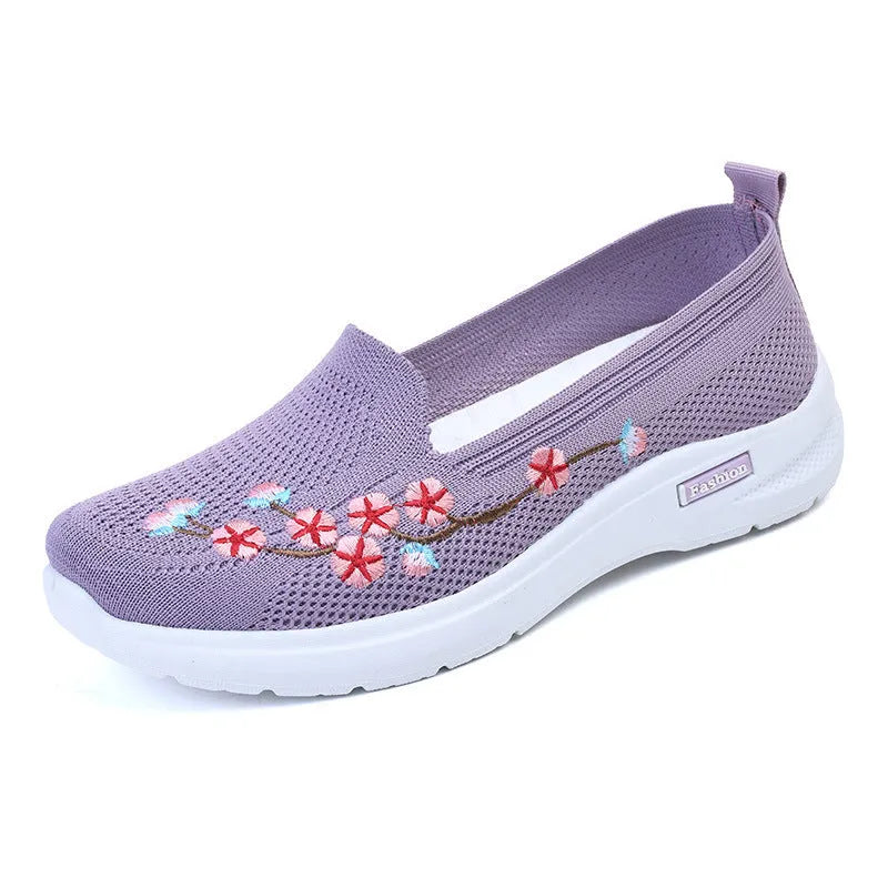 Women's embroidered woven sports pumps in wine red with a low flat heel and round toe.