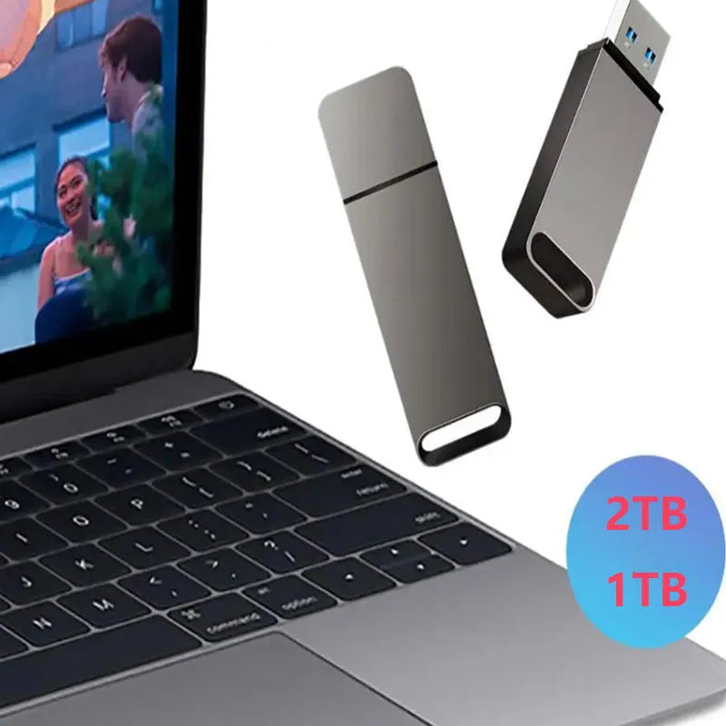 Customisable metal USB flash drive in black, red, and silver colours showing large capacity options.