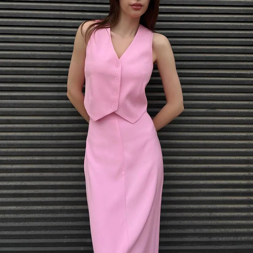 Pink polyester sleeveless vest and long split skirt suit for women
