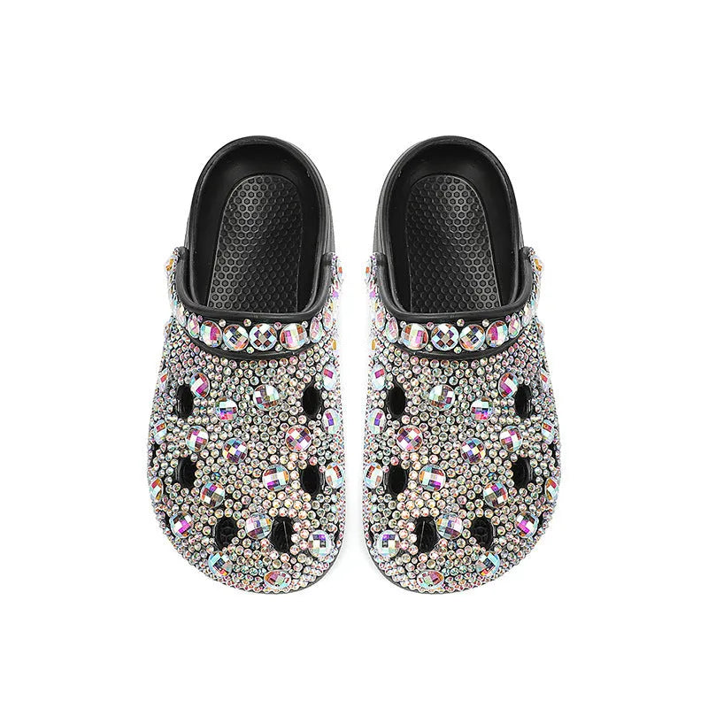 Black women's platform sandals with rhinestone straps and a textured EVA sole.