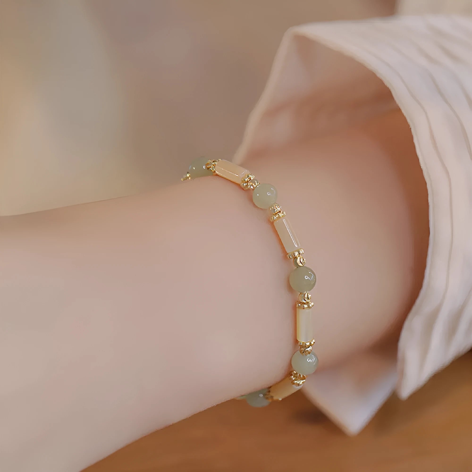 Hetian jade bamboo joint bracelet for women in 6mm size, shown in jade green and South red colour options.
