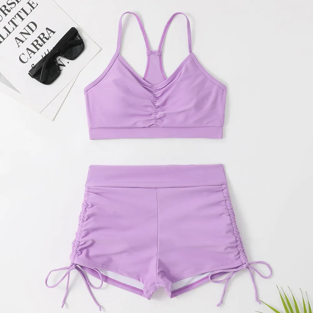 Women's solid purple high waist split swimsuit bikini two-piece set on mannequin