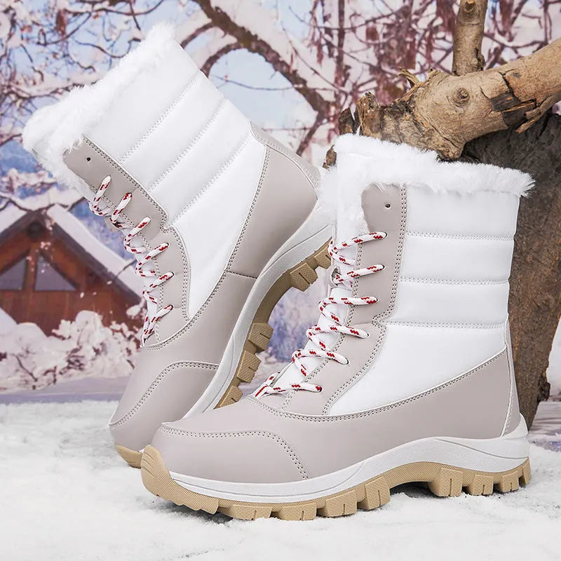 Women's fleece lined padded winter snow boots in black with rubber sole and front lace-up