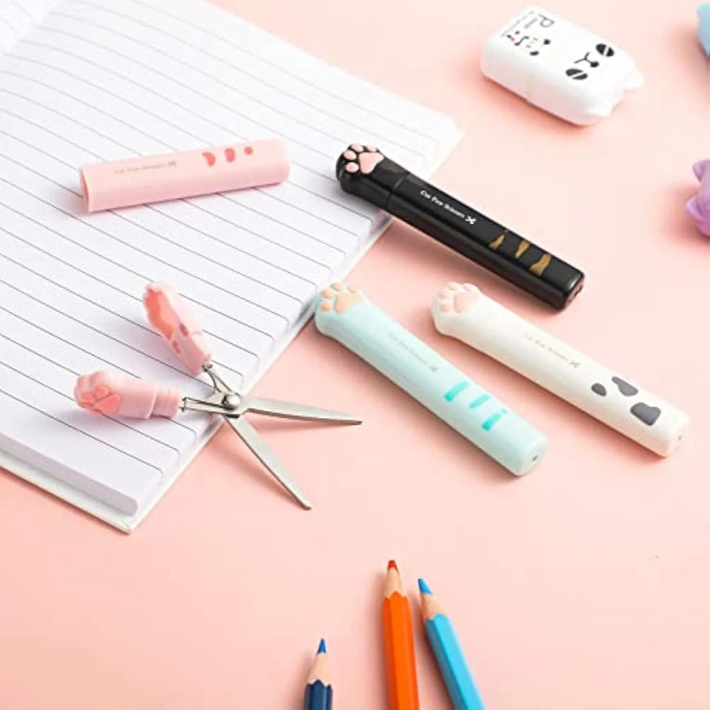 Cat paw mini folding scissors in four colours showing closed safety position and decorative handles