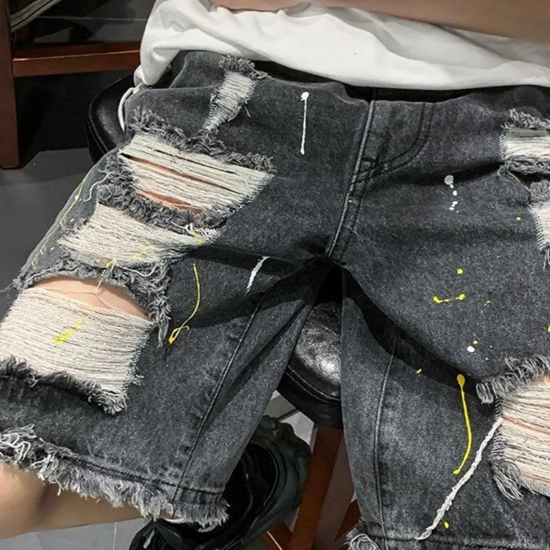 Men's water washed hole detail denim shorts in loose fit fifth length design
