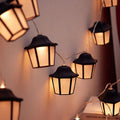 Warm white LED lighting chain with retro lantern style, shown in lengths from 1 m to 6.5 m for garden and villa decoration
