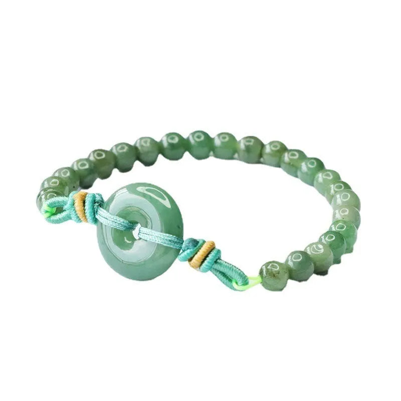 Oil green jade bracelet with star-shaped beads and a silver safety buckle clasp.