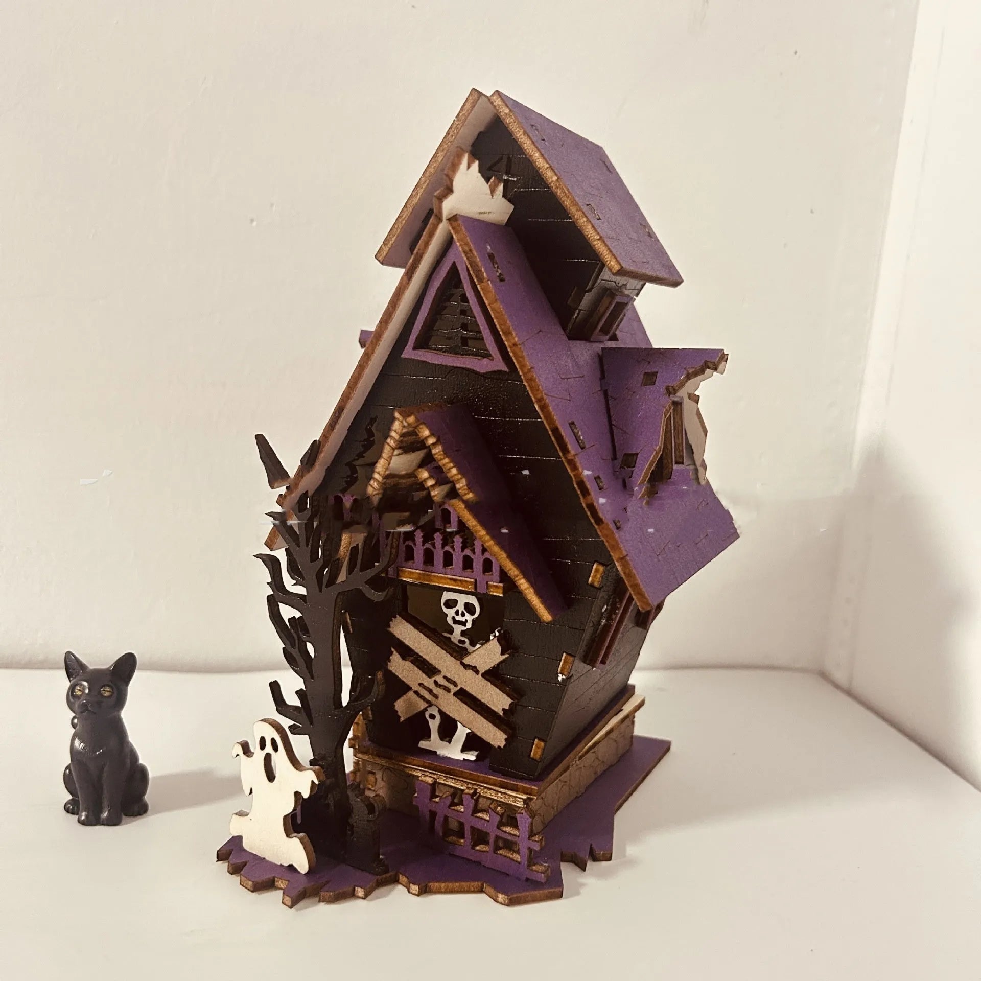 Wooden Halloween haunted house table decoration with candlestick design