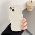Liquid solid colour wavy edge silicone TPU phone case for iPhone 16 series, frosted finish, back cover style