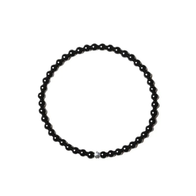 Electroplated agate obsidian blue San bracelet with 4mm geometric beads on wrist