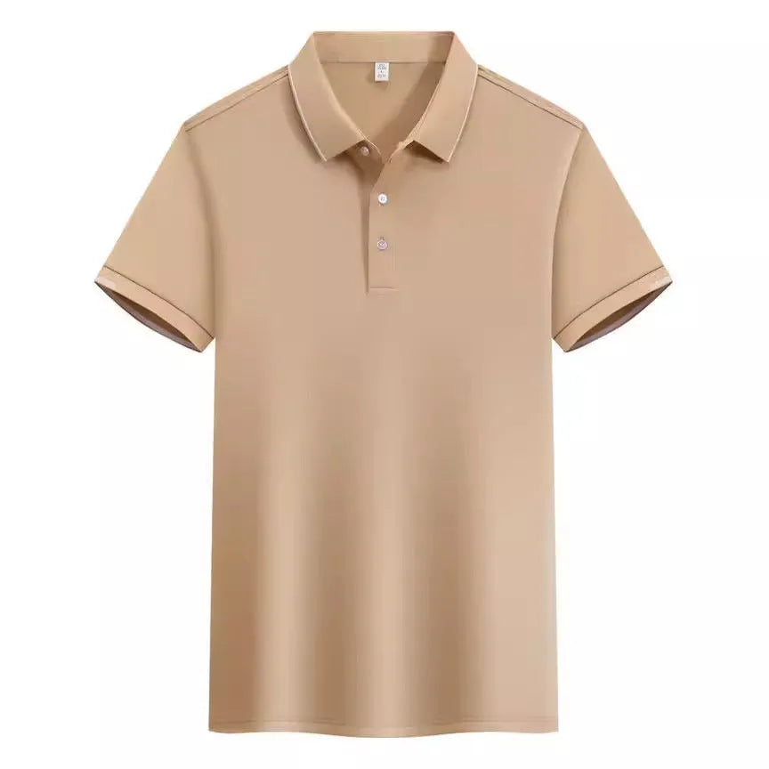 Man wearing a loose fit apricot coloured short sleeve cotton blend polo shirt.