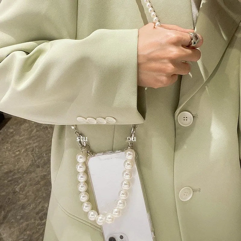 Soft silicone iPhone case with large pearl decoration and attached chain in Japanese Korean style