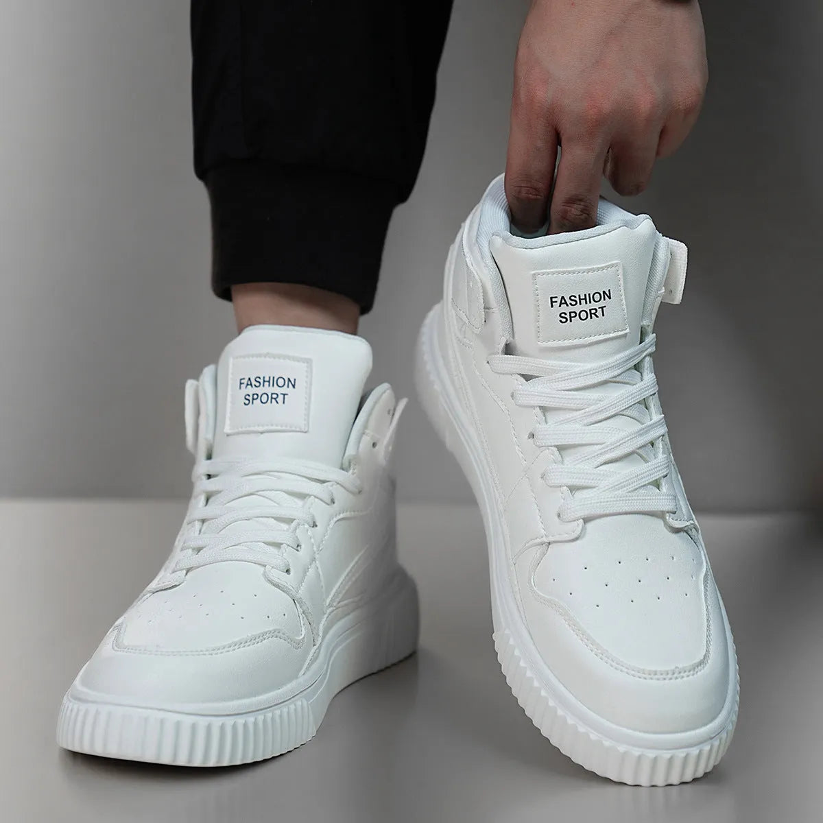 Men's white microfiber leather casual shoes with round toe design on neutral background