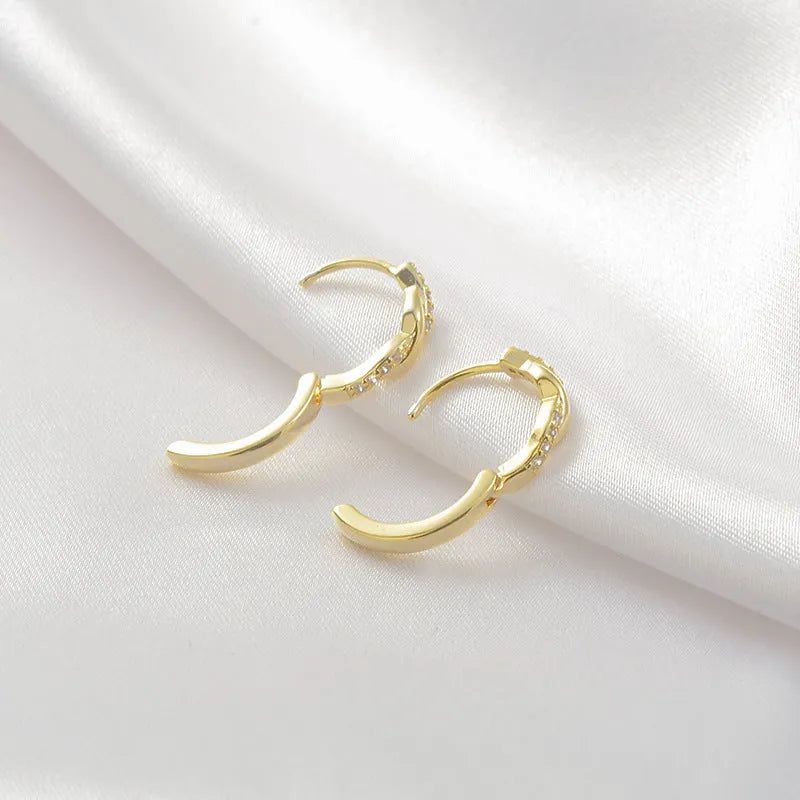Geometric hemp rope earclip earrings in gold and silver metallic finishes