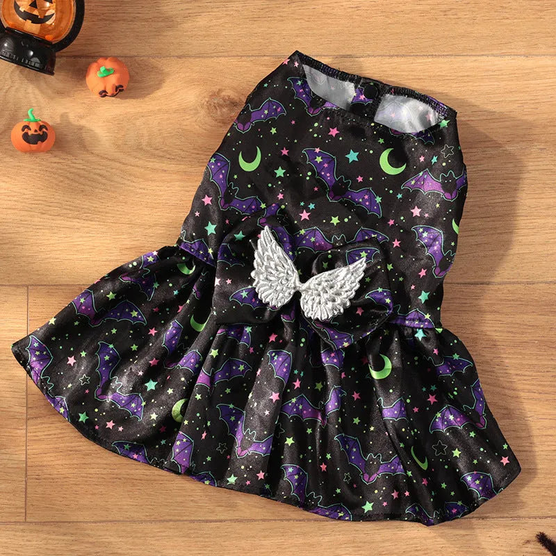 Halloween dog costume with angel wings in bright pumpkin orange and bat print patterns