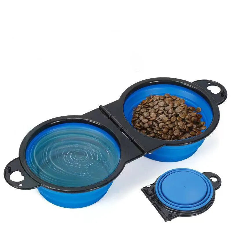 Blue silicone folding pet bowl showing two compartments for food and water in unfolded position
