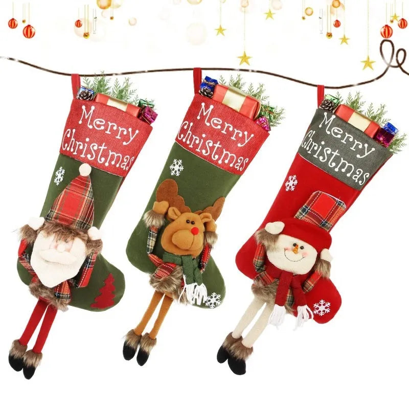 Three large red Christmas stockings with Santa, Snowman and Reindeer 3D applique designs