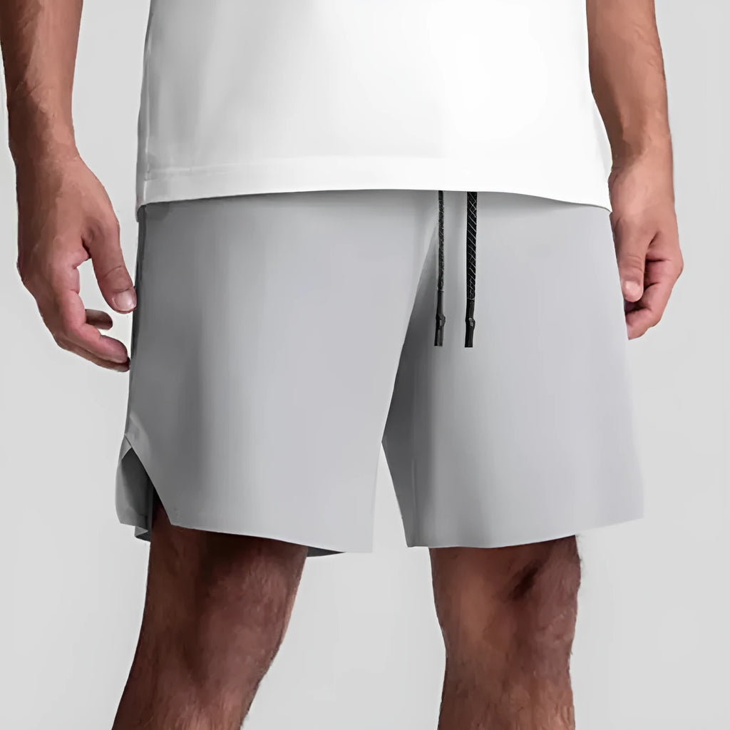 Men's grey micro-elastic sport shorts with knee-length straight-leg cut for summer training