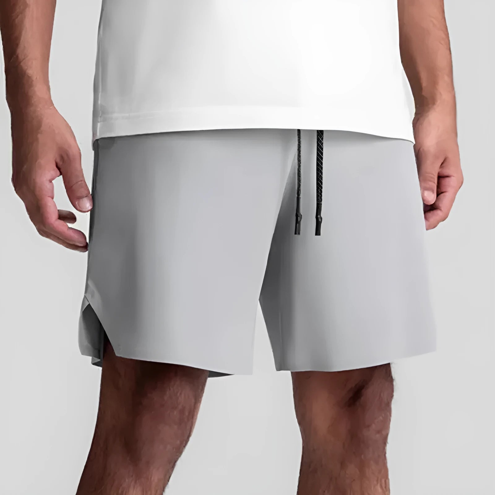 Men's grey micro-elastic sport shorts with knee-length straight-leg cut for summer training