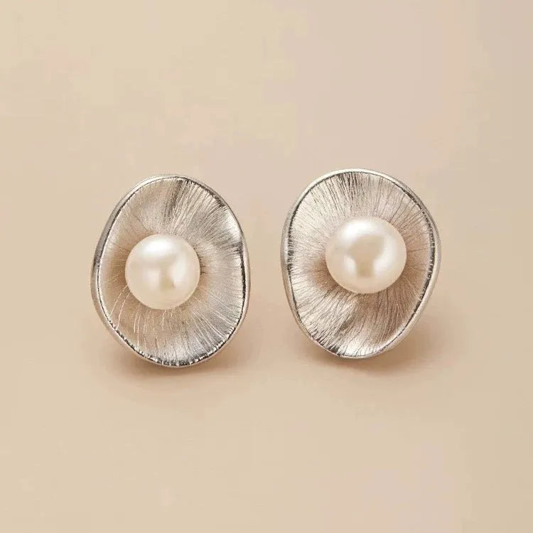 Pearl sterling silver geometric ear studs with gold electroplating and needle post fastenings