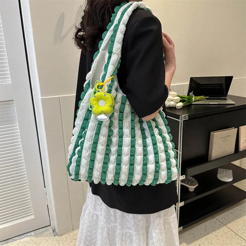 Women's pleated bubble crossbody handbag in soft polyester with pendant accessory
