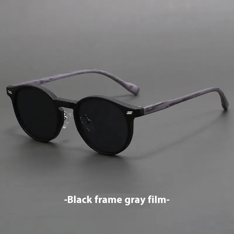 Retro round rim sunglasses with frosted frame and UV-protective lenses in multiple colour options.