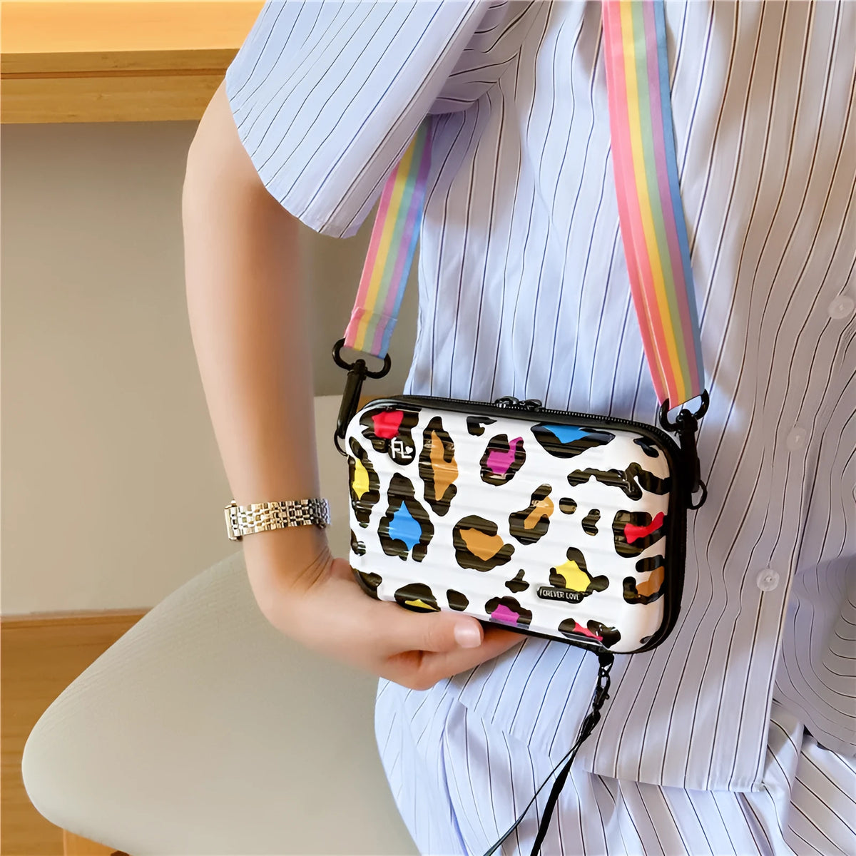 PVC one-shoulder cross body bag with geometric pattern, 18cm wide, 11cm high, 110cm strap, no lining