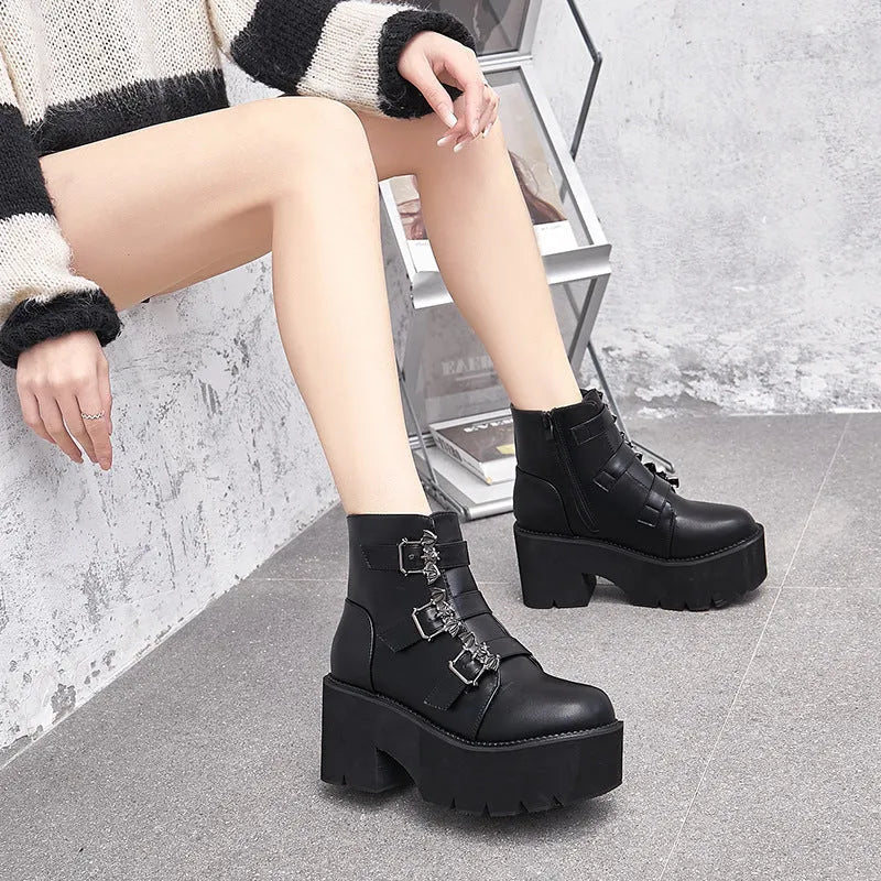 Black ladies punk Martin boots with bat buckle, thick heel, side zip, and round toe.