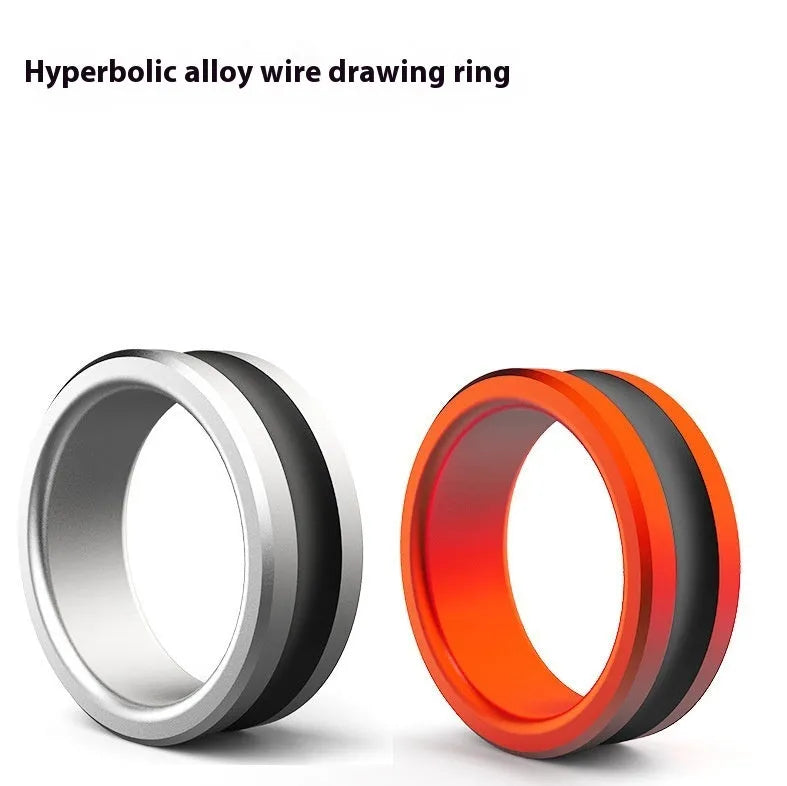 Orange and silver alloy fishing hand guard pull loop tool on a non-slip surface.