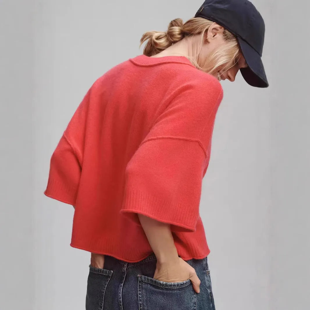 Red viscose short t-shirt with exposed navel detail on a mannequin, showing regular sleeves and pullover style.