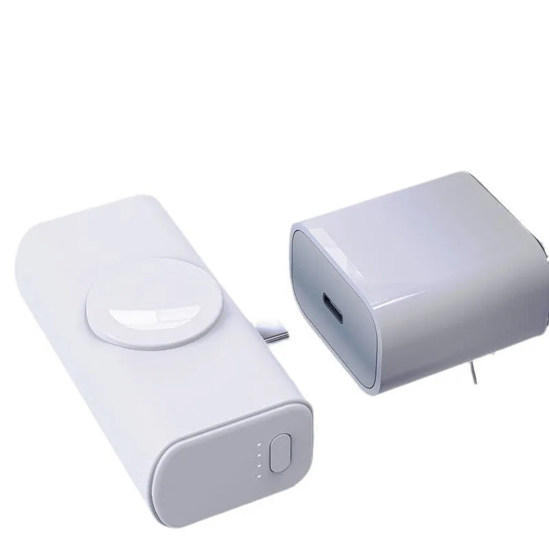 Portable 5000mAh power bank with folding double head charger, compact capsule design in black plastic