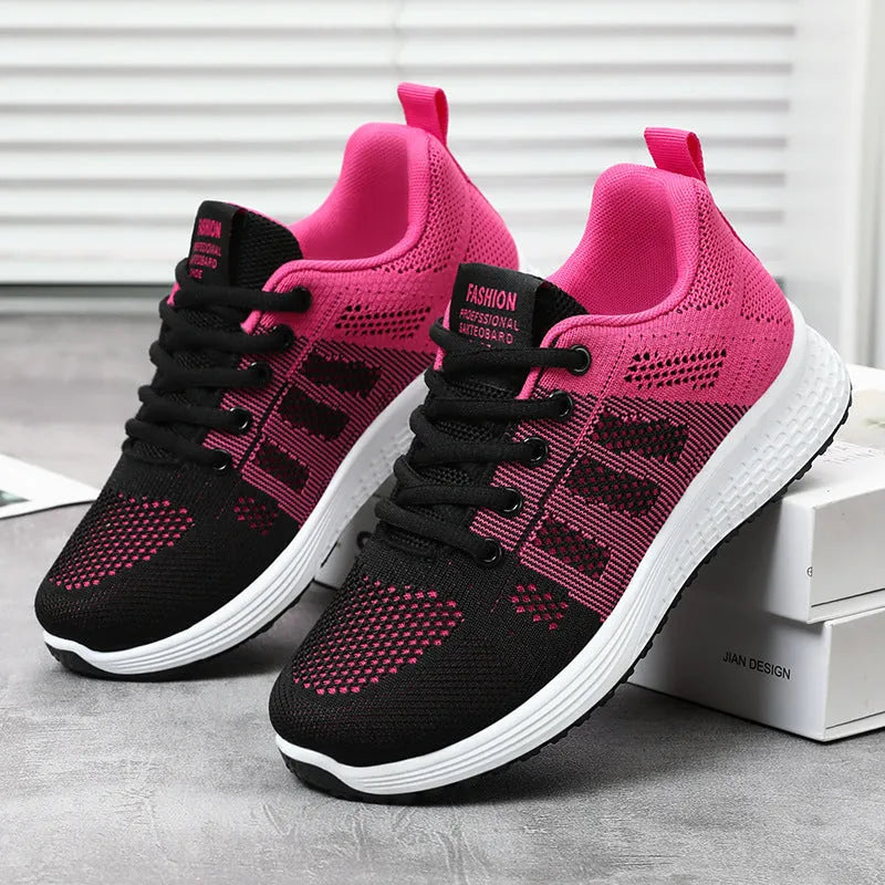 Women's Flyknit running shoe in black, rose red, or gray pink with soft sole and flat heel.