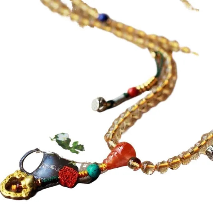 Brazil natural citrine bracelet with 1mm yellow beads on filament string