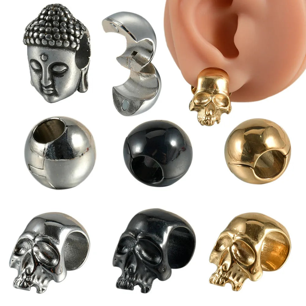 Stainless steel hollow geometric earrings combining a skull with a Buddha head motif.