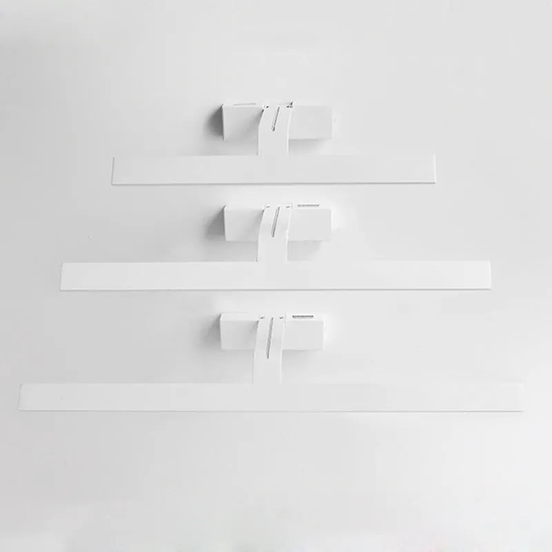 White LED bathroom mirror headlight with three-colour dimming on a vanity.