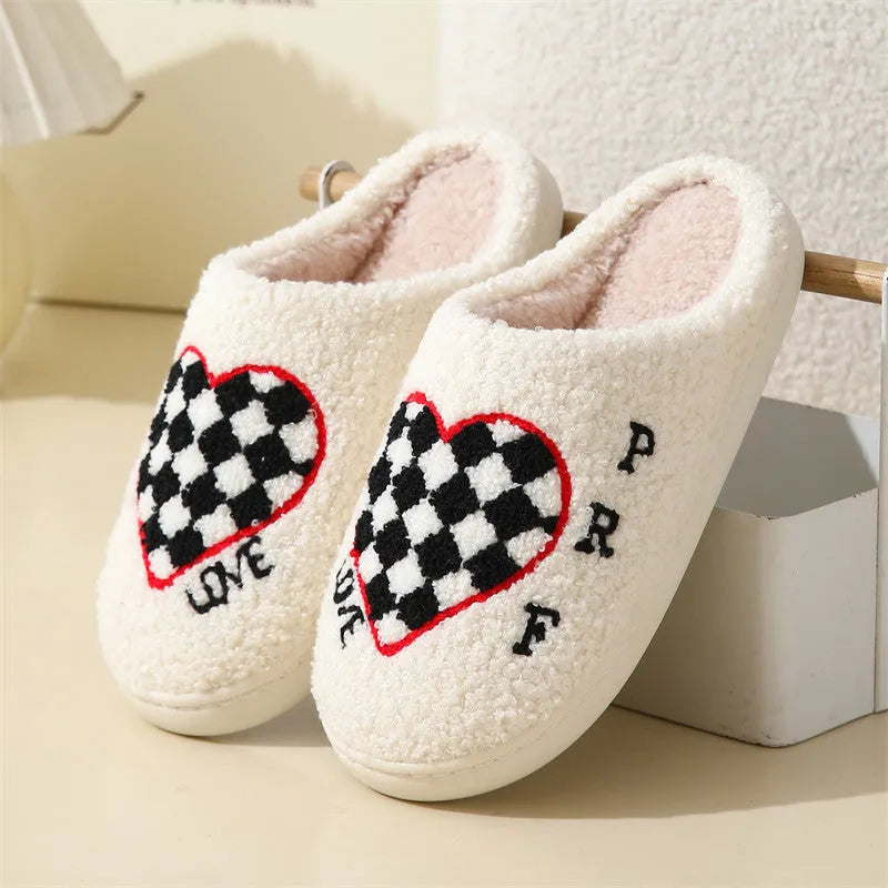 Pair of Halloween cartoon indoor slippers with spider pattern suede upper and PVC sole