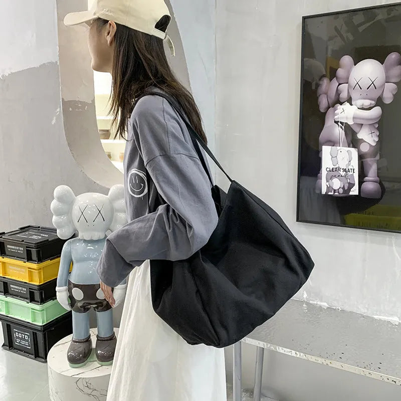 Women's solid colour canvas handbag with double shoulder straps and mobile phone pocket