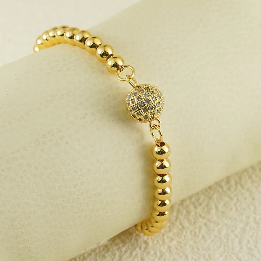 Arabic style women's copper bracelet with heart-shaped pendant featuring single zircon stone