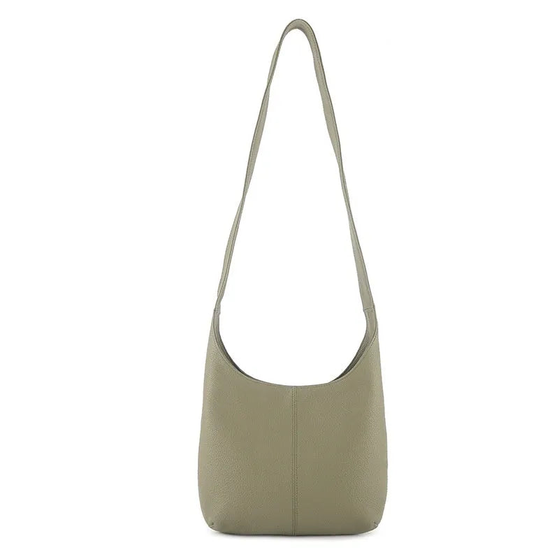 Genuine top grain leather women's crossbody bag in vertical square urban minimalist style with zip closure, shown in black.