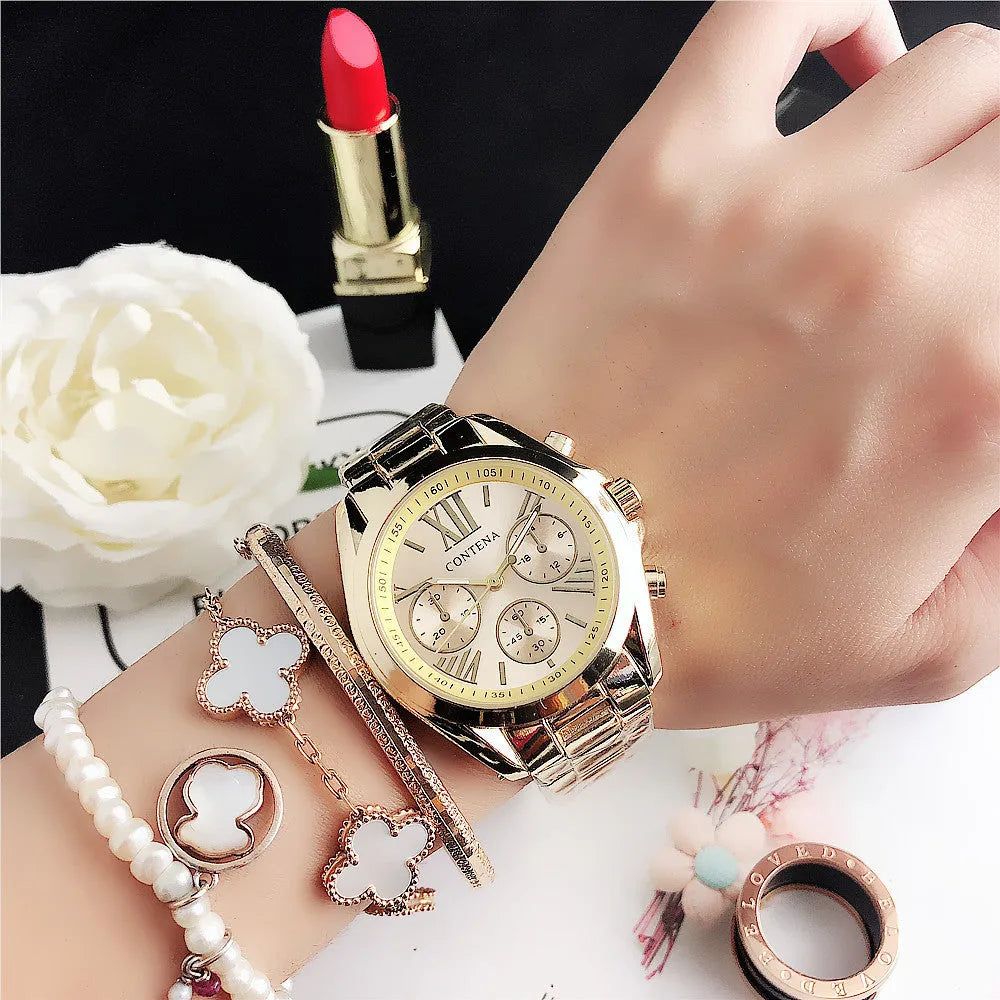 Women's silver rose gold diamond quartz watch with mesh strap, 15mm thick case.