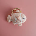 Crocheted wool fish keychain in cartoon ugly fish doll style with key ring, shown in orange, blue or pink