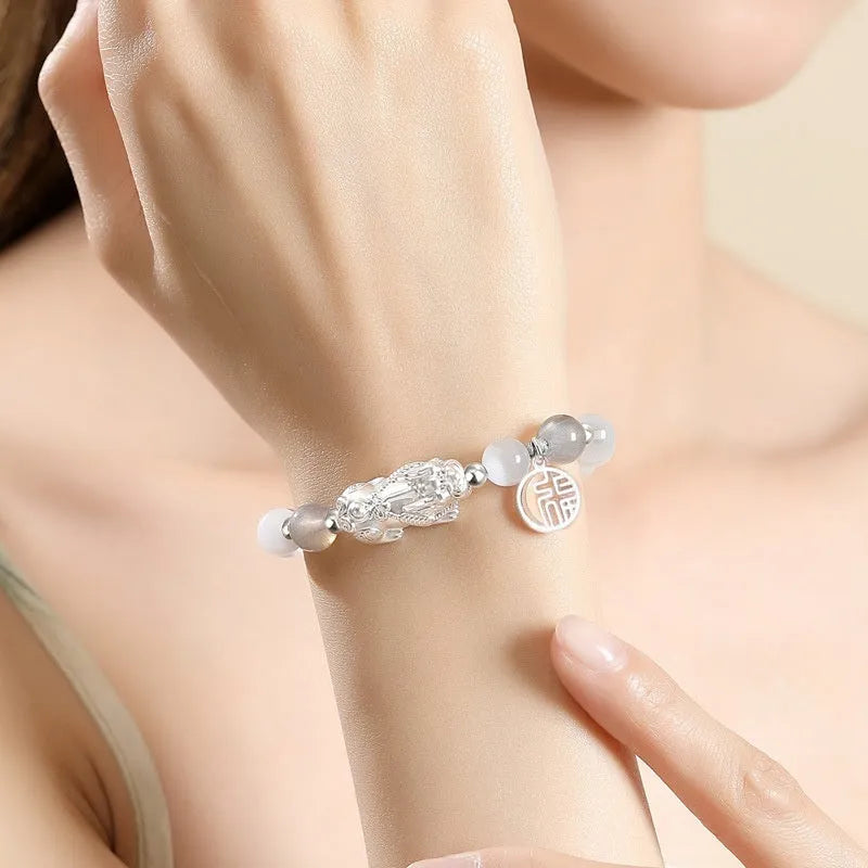 Sterling silver couple bracelet with hand-woven leather band and tassel decorations in national fashion style
