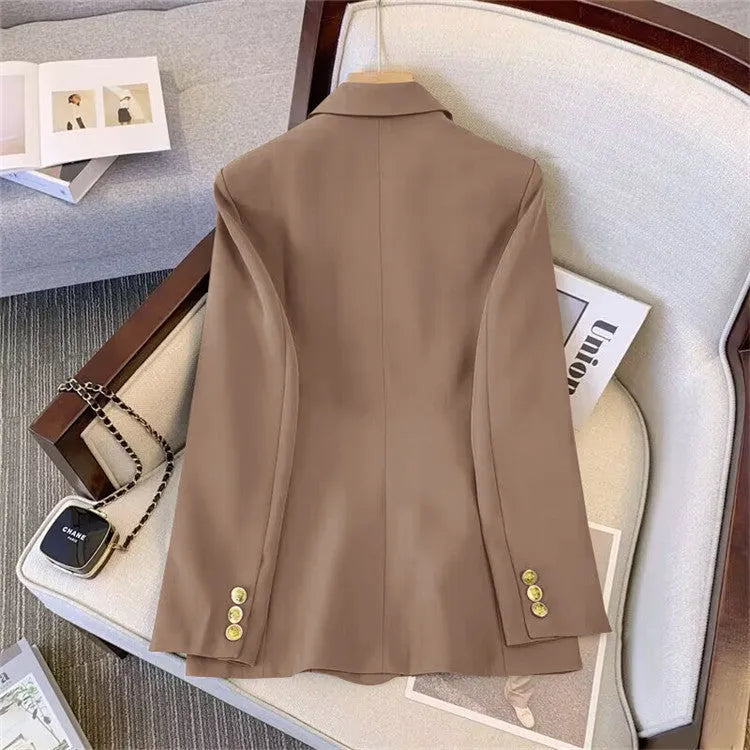 Women's loose fit polyester blouse in black with regular sleeves and slim fitting design