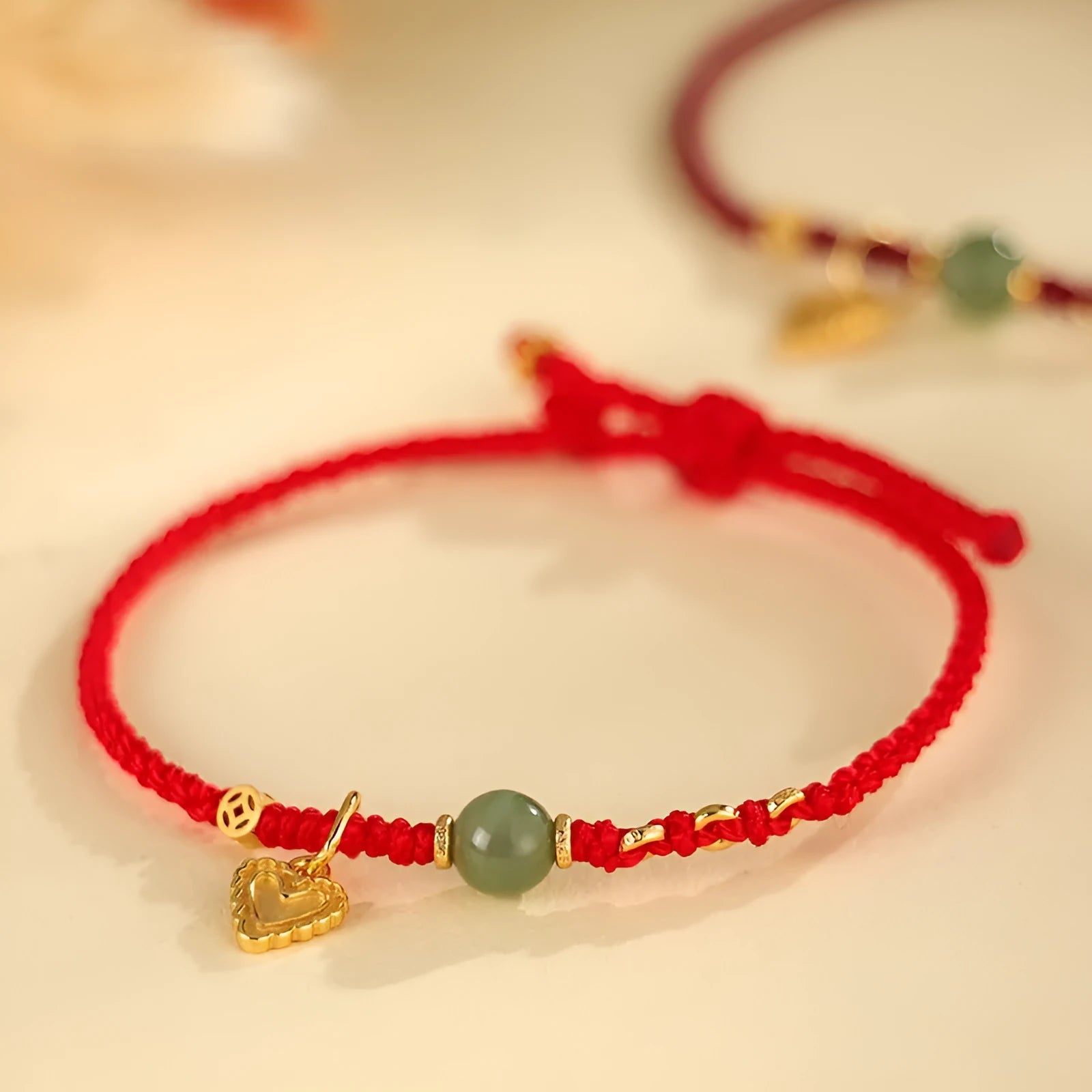 Handmade women's woven bracelet with 925 silver and Hetian jade in red strap option