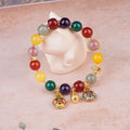 Hand-woven swallowing gold beast charm on 10mm agate bead bracelet