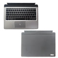 Elite X2 tablet base keyboard with PS/2 cable and multimedia keys on a table next to a thin tablet.